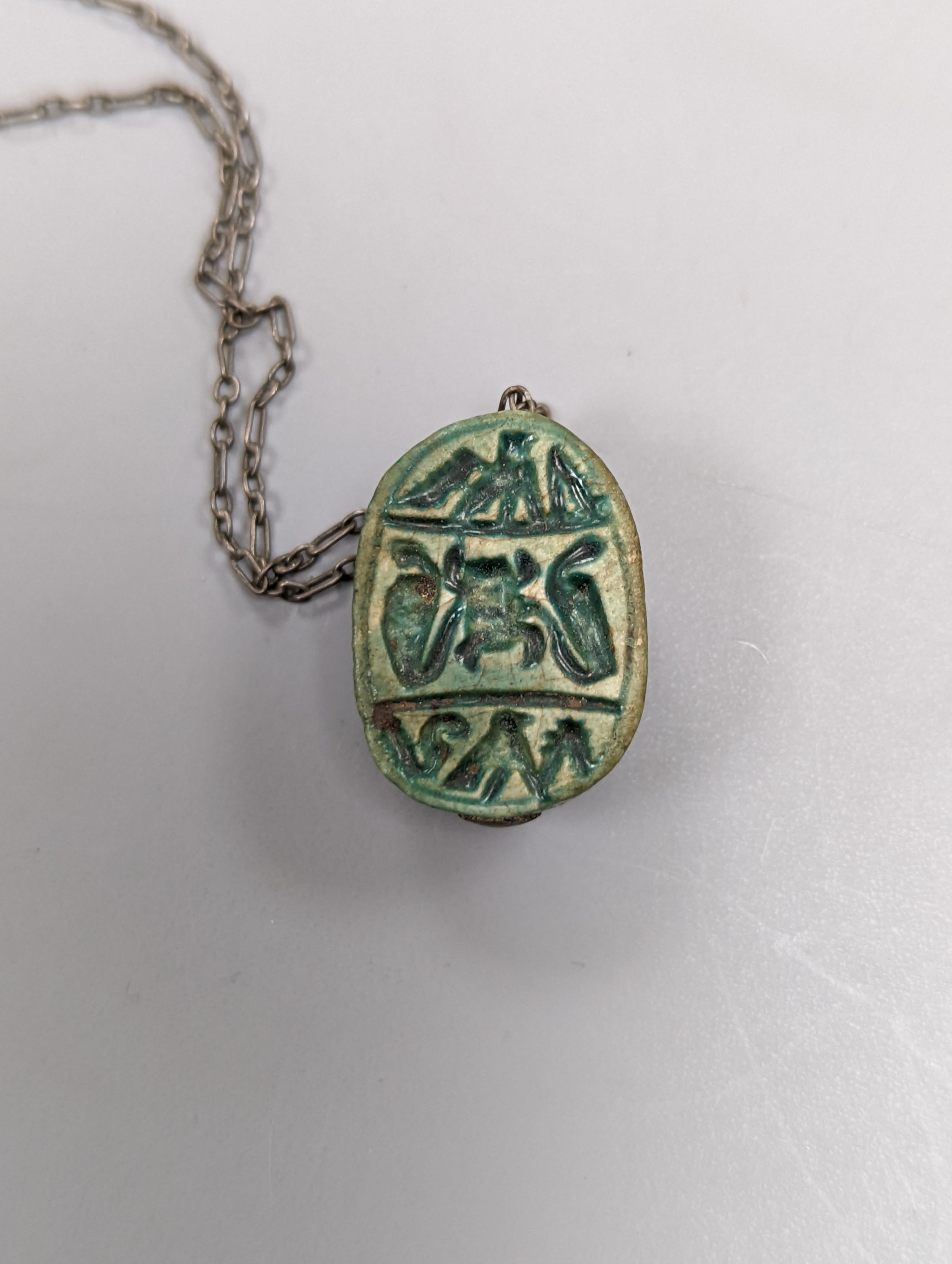 An ancient Egyptian faience and hardstone bead and scarab necklace and a small blue John bowl, 7cm